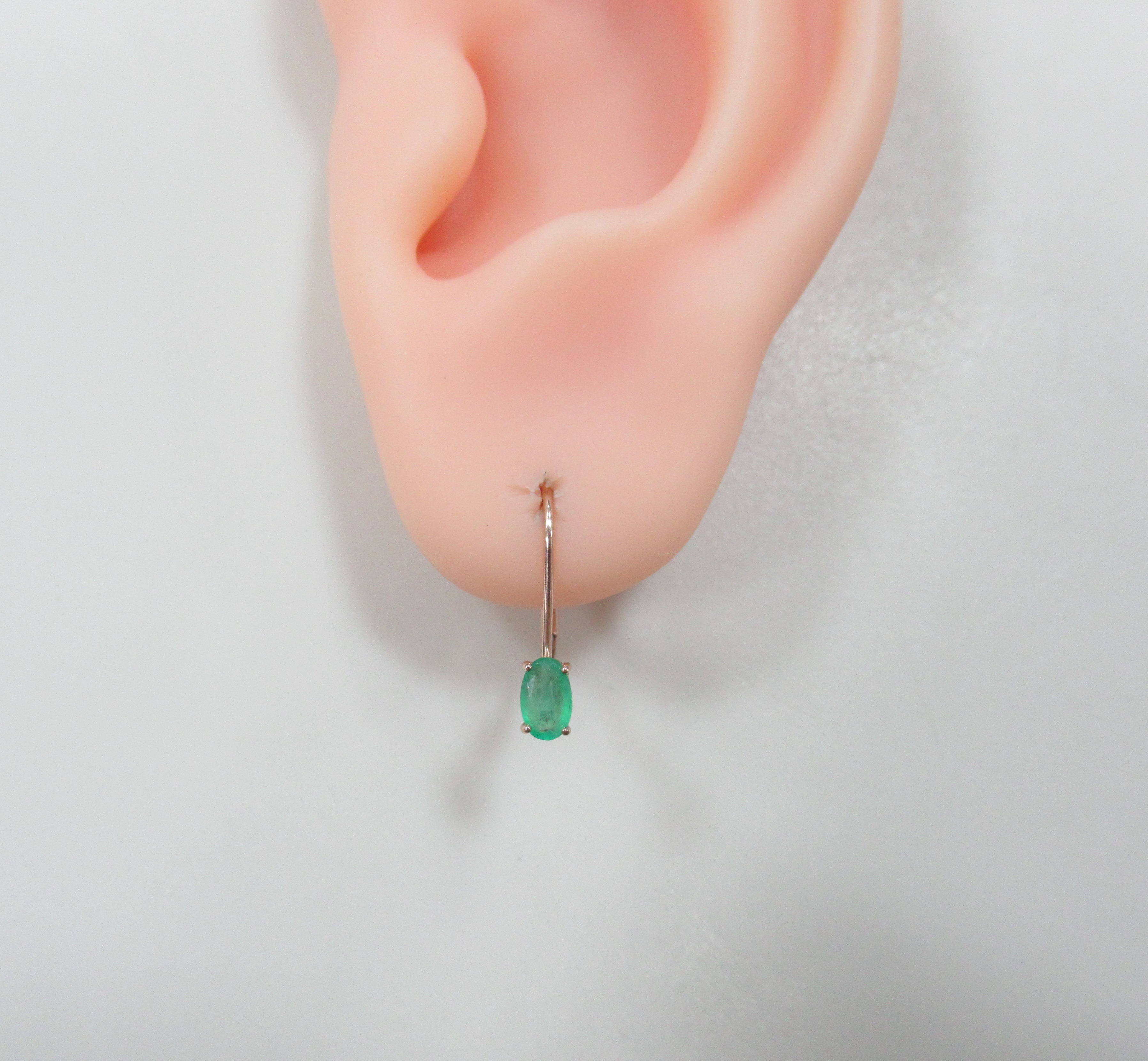 Серьги из золота с изумрудами